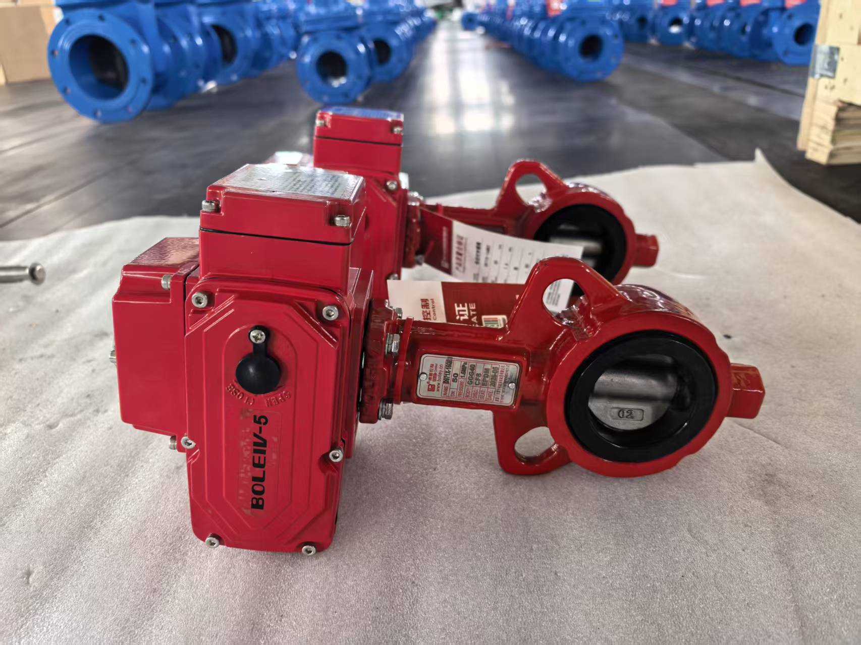 Actuated resilient-seated butterfly valves