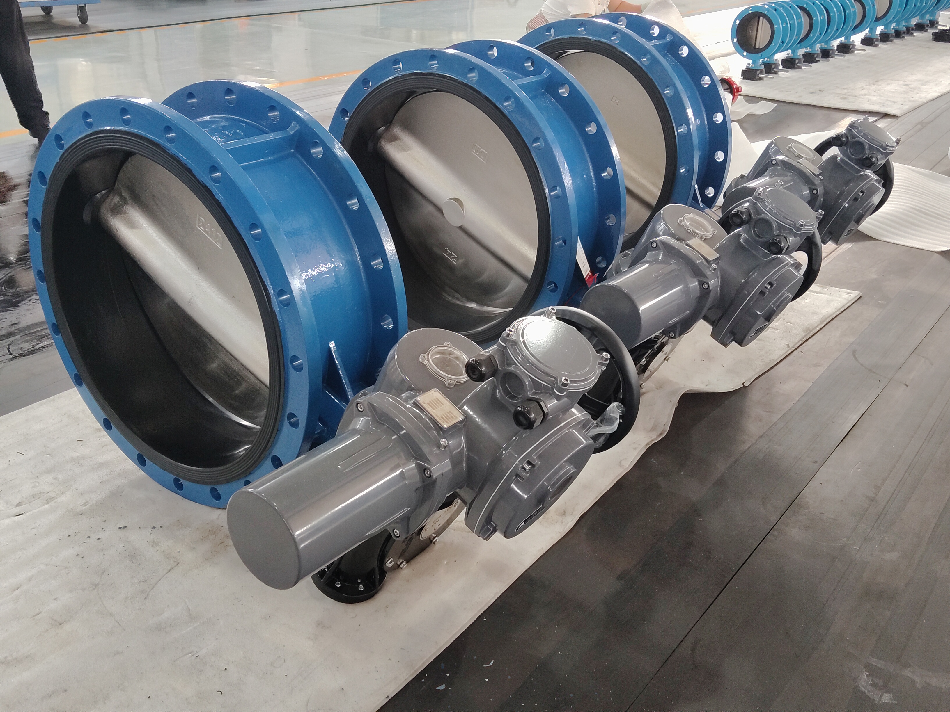 Actuated butterfly valves arranged for production